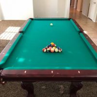 Pool Table with New Sticks